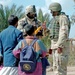 Staff Sgt. Stevie Knox talk with Iraqi children