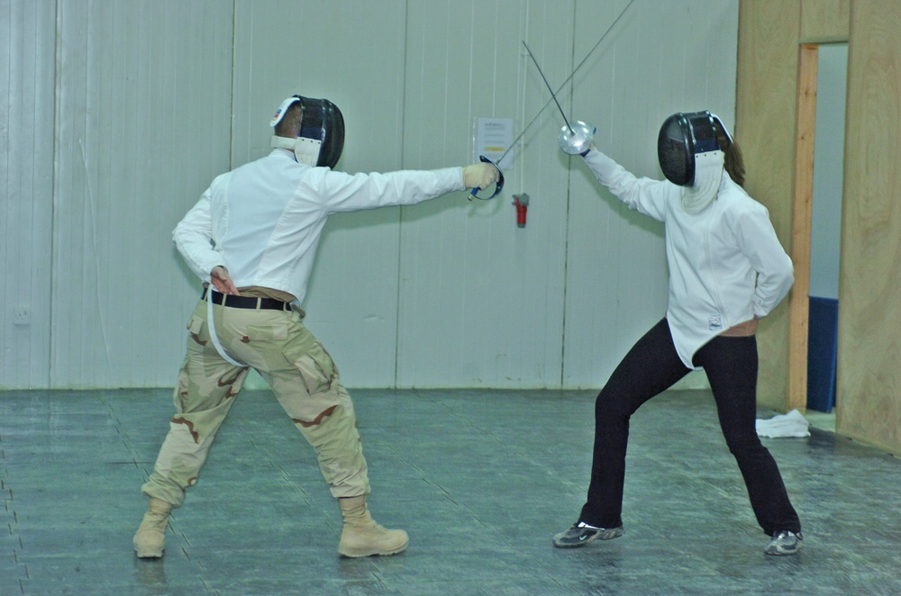 Master Sgt. Ted Bogosh coaches two of his students