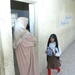A student happily returns to her classroom