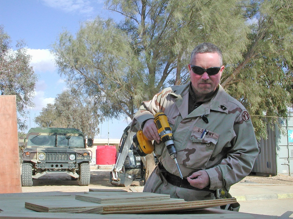 Master Sgt. David B. Hall uses his carpentry skills