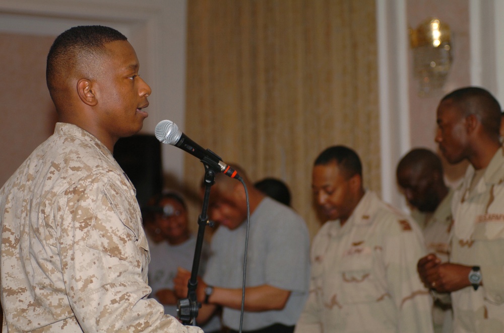 Staff Sgt. Hewitt Ballard practices with the gospel choir