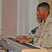 Spc. Jason Peoples accompanies the choir on piano