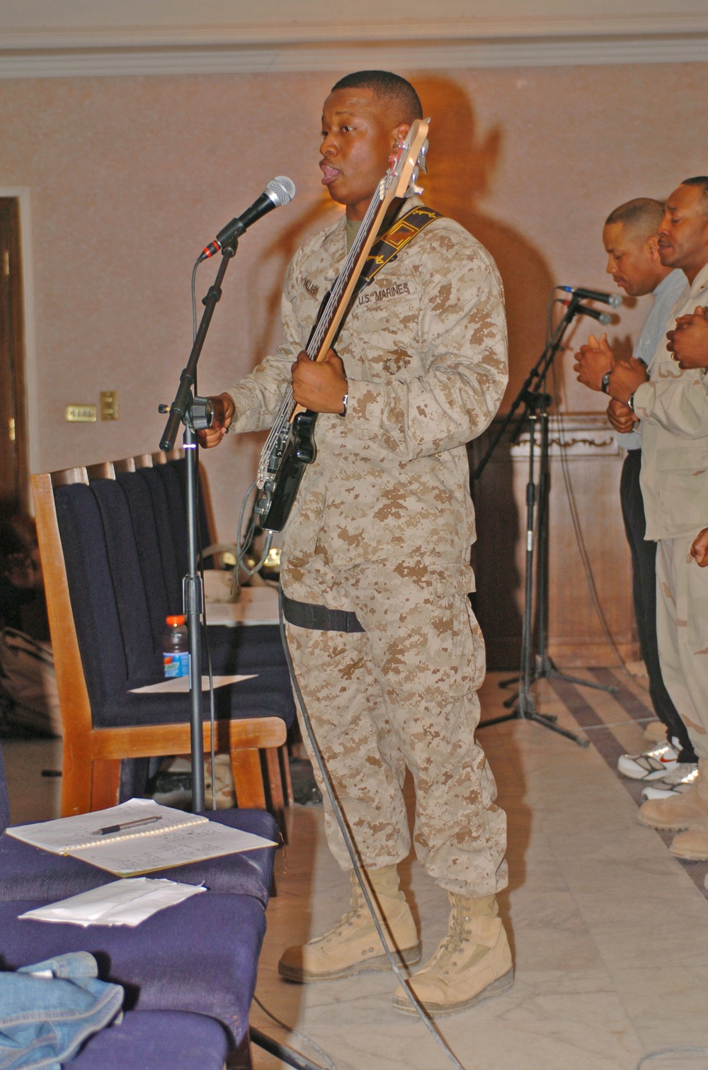 Staff Sgt. Hewitt Ballard practices with the gospel choir