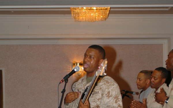 Staff Sgt. Hewitt Ballard practices with the gospel choir