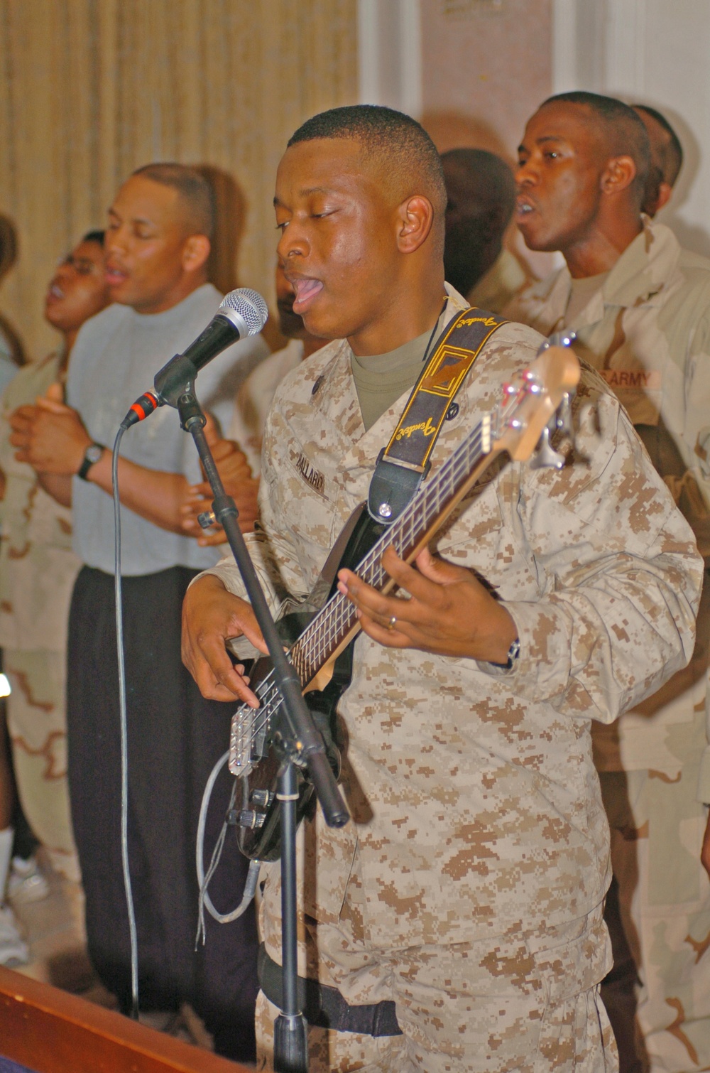 Staff Sgt. Hewitt Ballard practices with the gospel choir