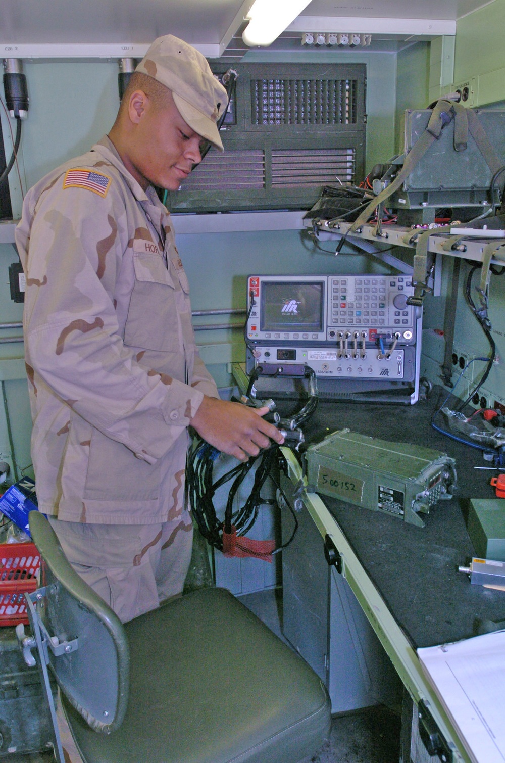 Spc. Horton works with the GRM-114B diagnostic test set