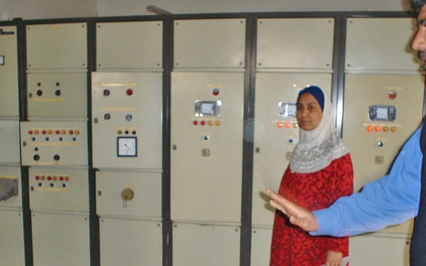 Employees at Sadr City sewer pump station 15