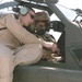Capt. Whiting shows a Kuwaiti air force pilot the controls