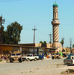 Soldiers stop traffic and search the town