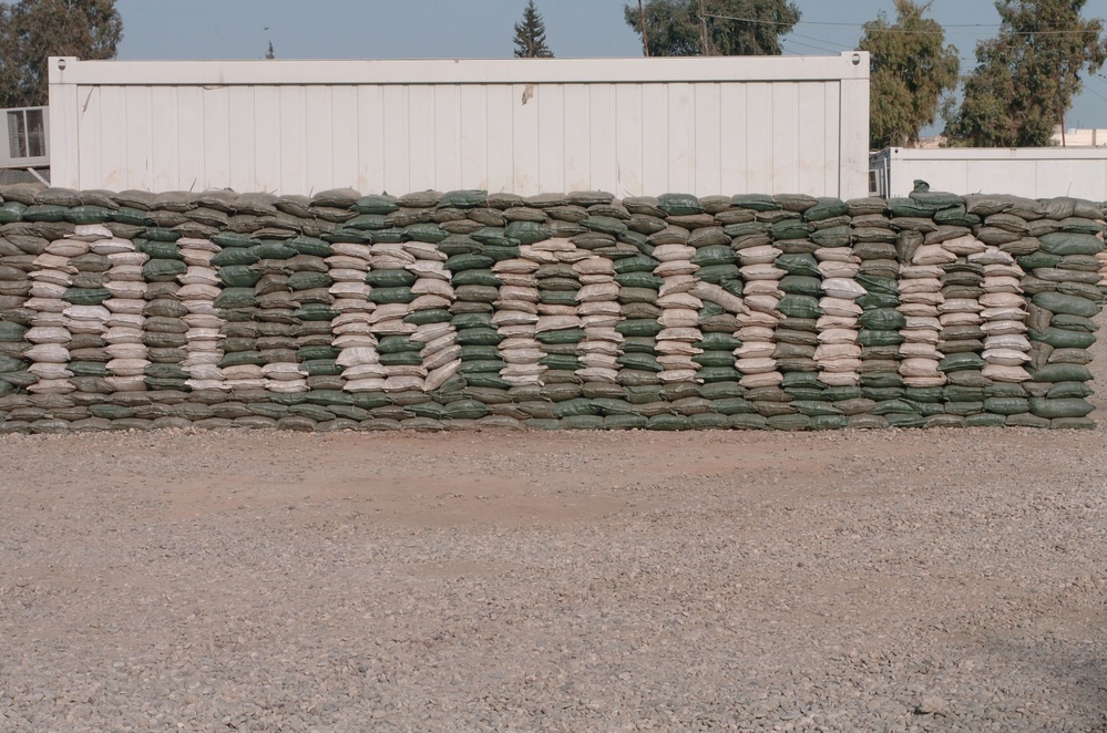 A sandbag monument to their homeland