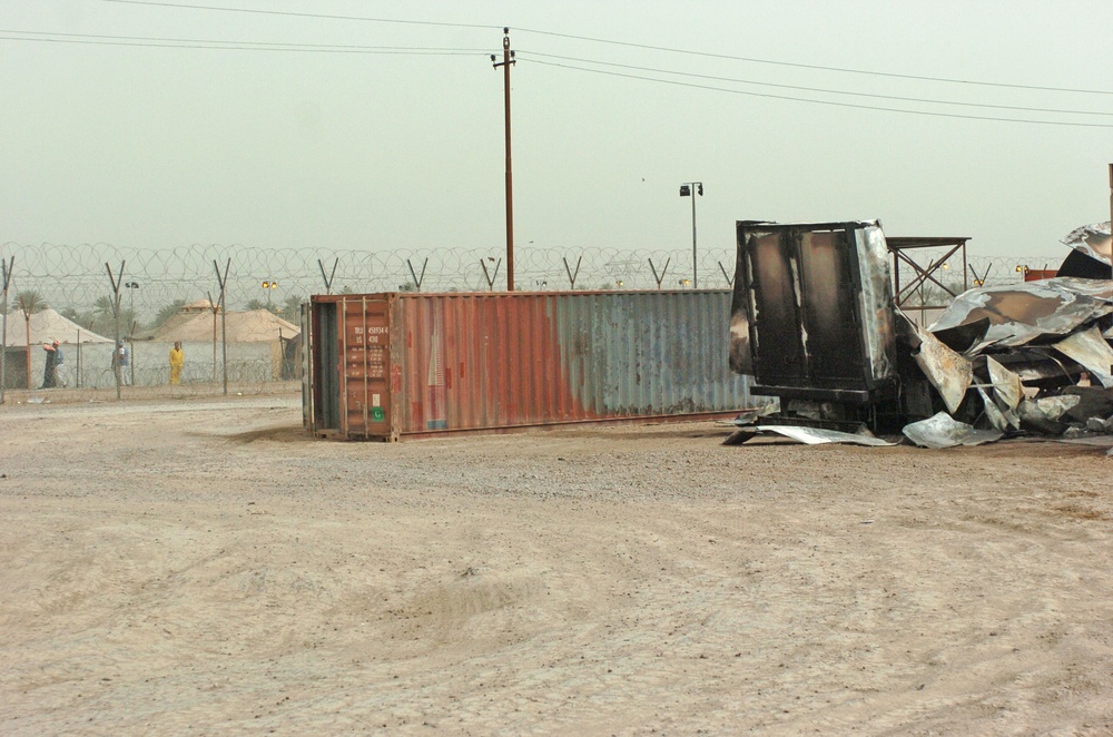 A cargo trailer at the prison compound was destroyed