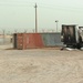 A cargo trailer at the prison compound was destroyed