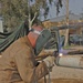 Sgt. Morris Steiner welds a bumper on a humvee
