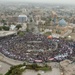 Residents of Baghdad listen attentively