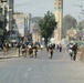 Iraqi army soldiers provide security along a march route