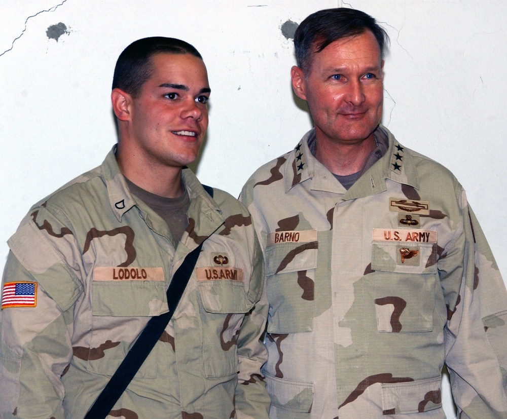 Lt. Gen. Barno poses for a photograph with Pfc. Lodol