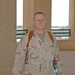 Cpt. David M. Rozelle stands on a third-floor balcony