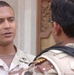 Staff Sgt. Kiplangat D. Marisin speaks to Iraqi Soldier