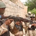 An Iraqi Army soldier pulls security during a patrol