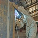 Pfc. Mandaline Hollenback welds an armored box