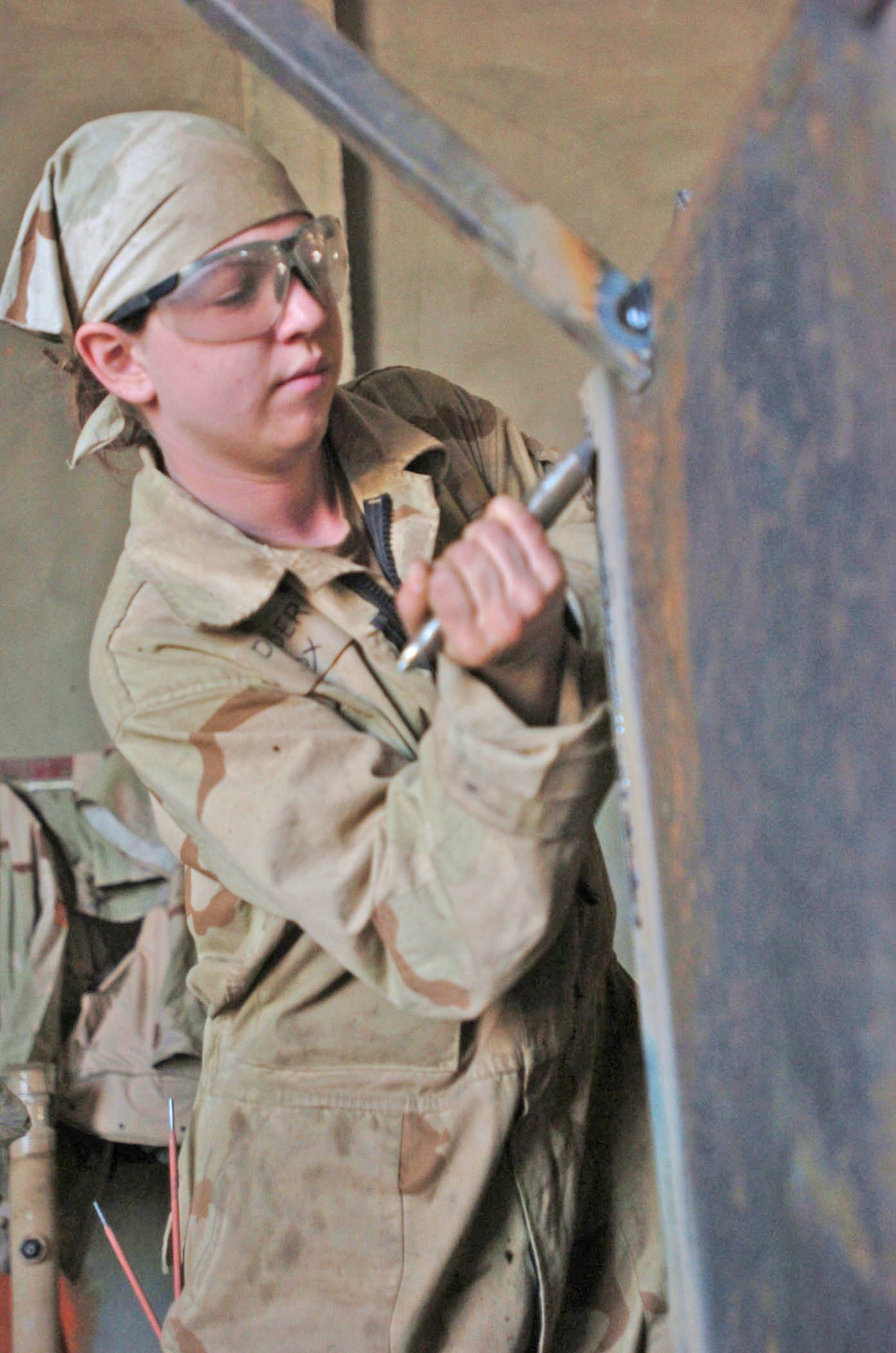 Pfc. Mandaline Hollenback smoothes out the edges