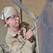 Pfc. Mandaline Hollenback smoothes out the edges