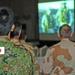 A Japanese Army Officer Watch a Picture Slide Show