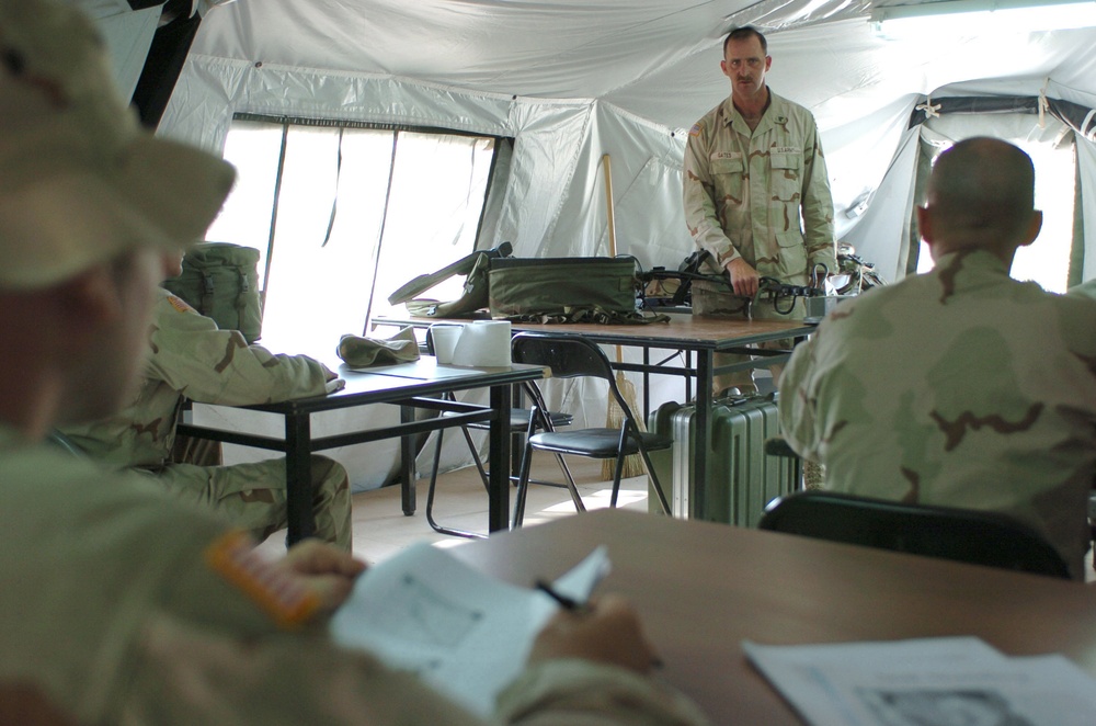 Sgt. Ronald Todd Gates teaches a class of Soldiers