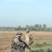 Iraqi Army Soldiers secure an open area north of Salman Pak