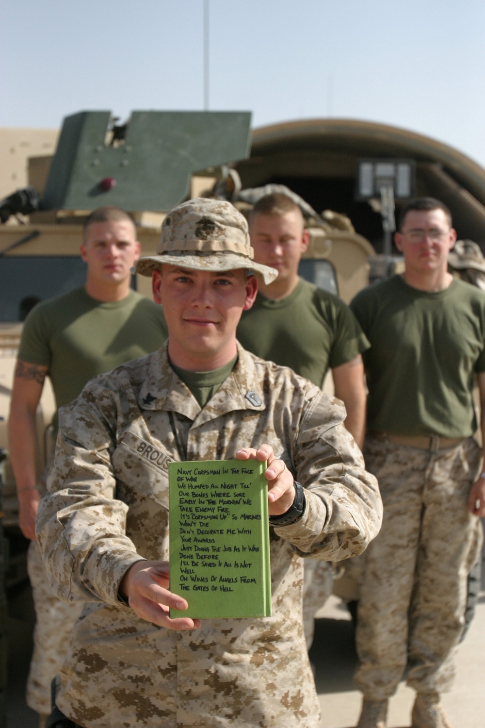 Petty Officer 3rd Class Curtis Brouse displays his poem
