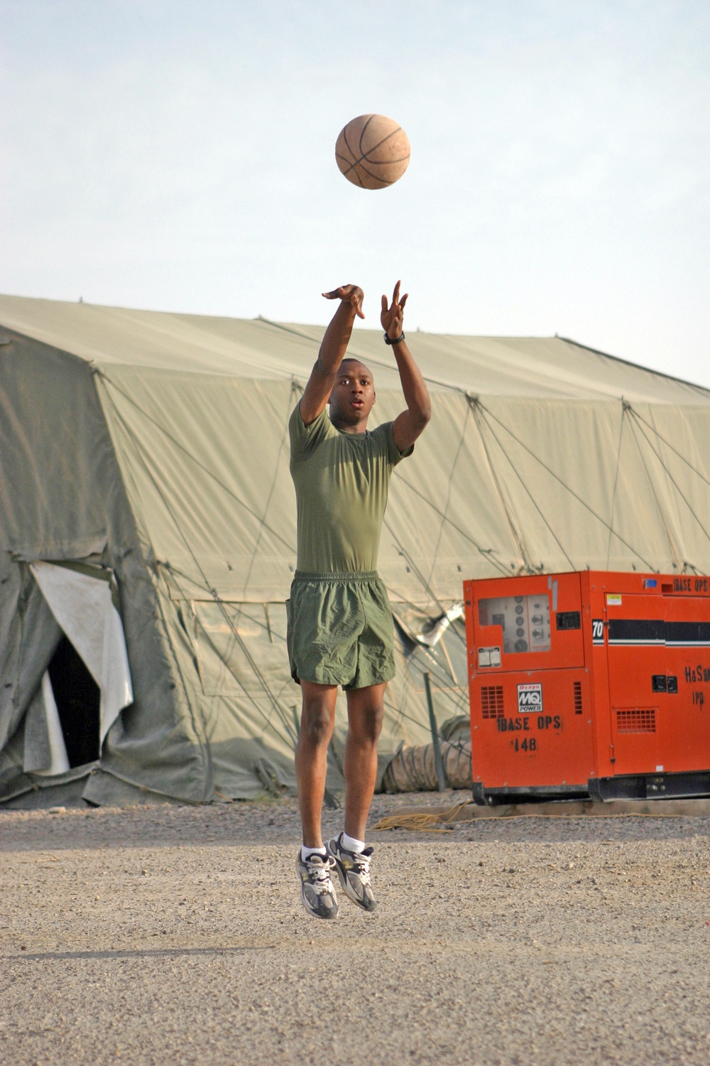 PFC Jamon Roberts plays basketball during his time off