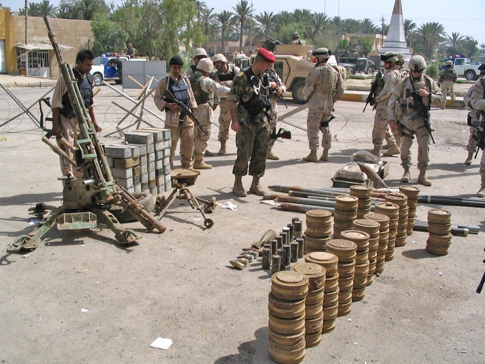 Local Iraqis turned in a large collection of weapons