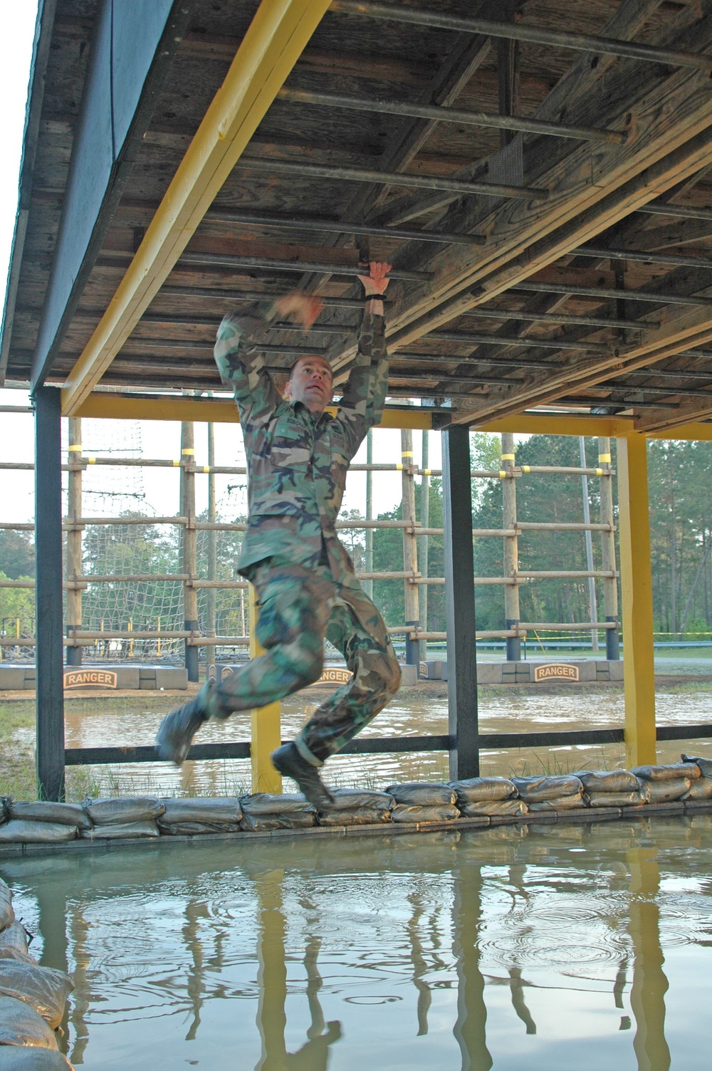 Maj. Frank Sobchak navigates the Malvesti Obstacle Course