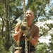 Sgt. 1st Class Gerald Nelson climbs a 90-foot rope