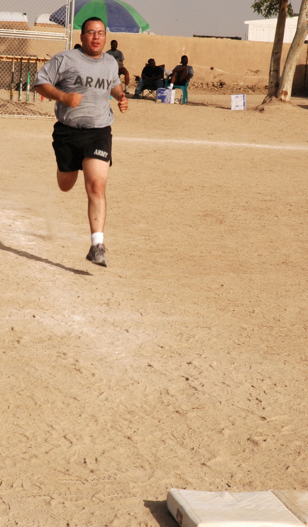 David J. Cruz sprints down to first base