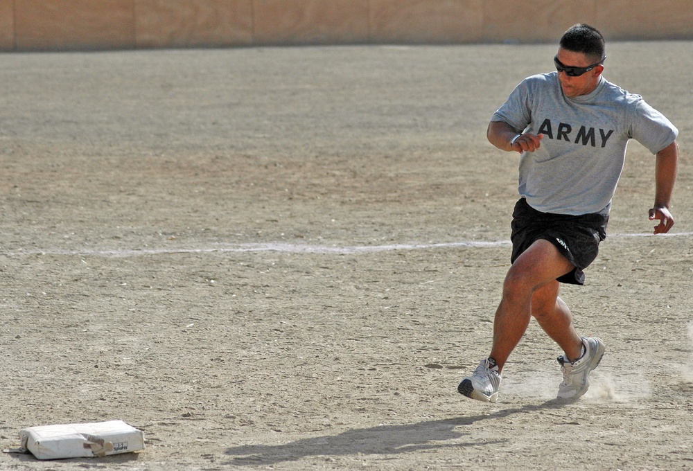 Richard M. Largo rounds third base to score