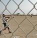 Left-centerfielder Fred Casticimo takes a cut at the ball