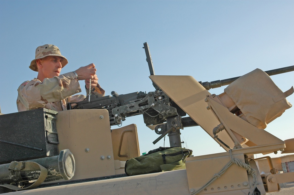 Sgt. Brian Jones checks a .50-calibur machine gun