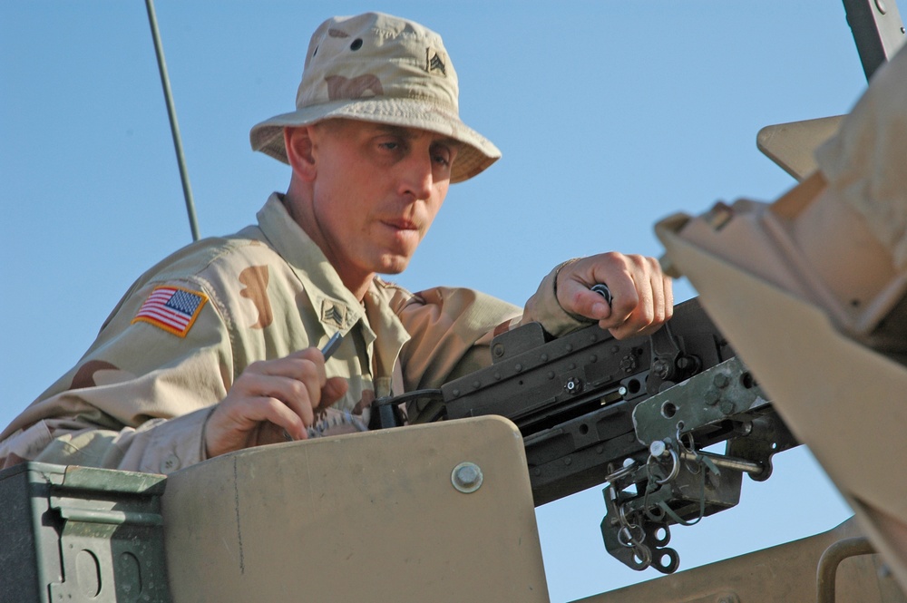 Sgt. Brian Jones checks a .50-calibur machine gun