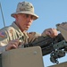 Sgt. Brian Jones checks a .50-calibur machine gun