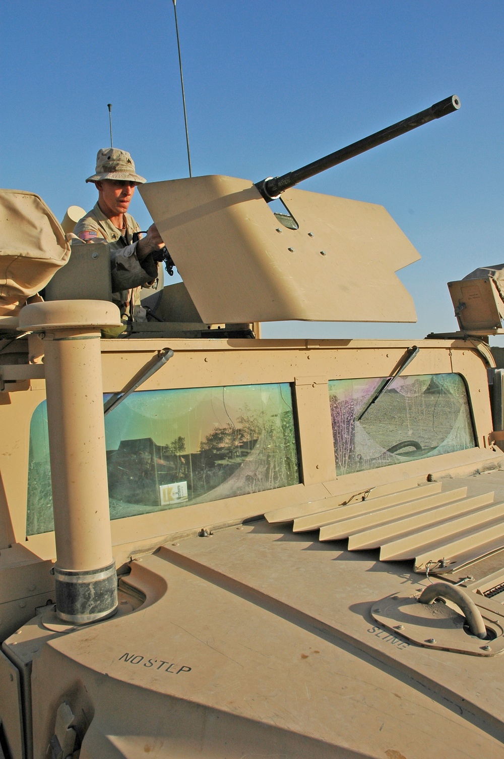 Sgt. Brian Jones checks a .50-calibur machine gun