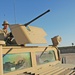 Sgt. Brian Jones checks a .50-calibur machine gun