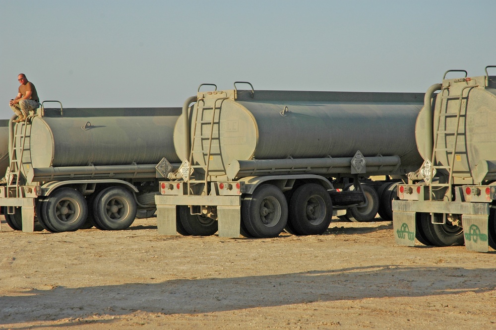 A driver quietly prepares himself before convoying