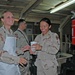 Spc. Emily Wiest delivers the first-ever cup of iced coffee