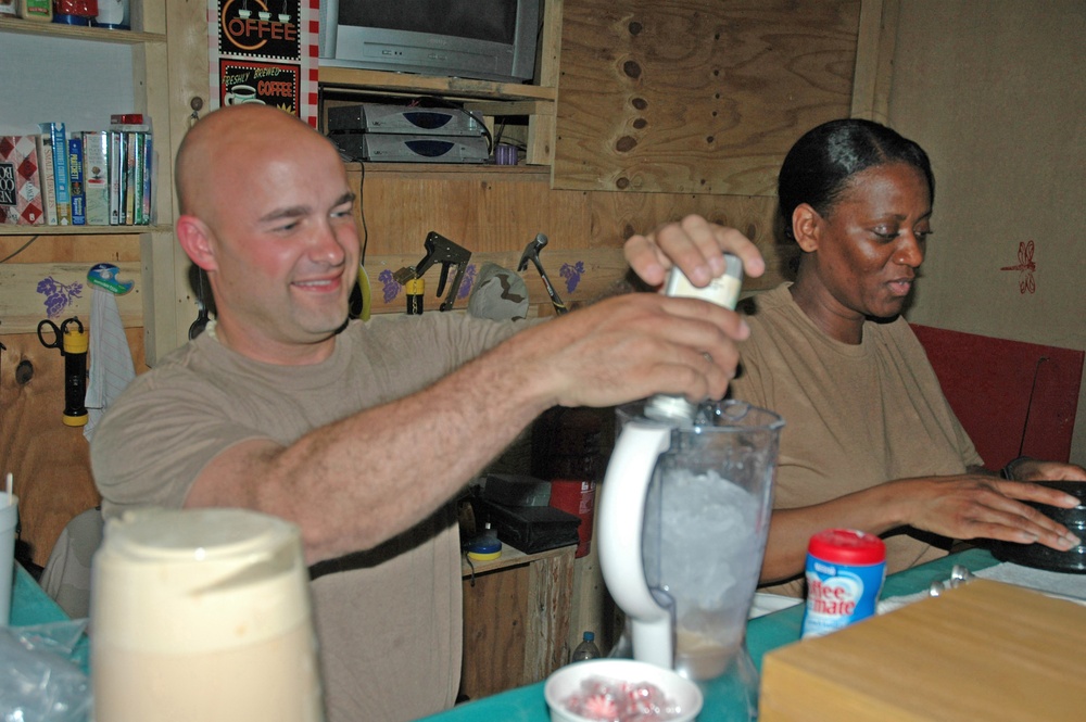 Sgt. 1st Class Rick Weiss prepares a batch of iced coffee