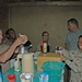 Soldiers crowd around the counter of the Coffee House