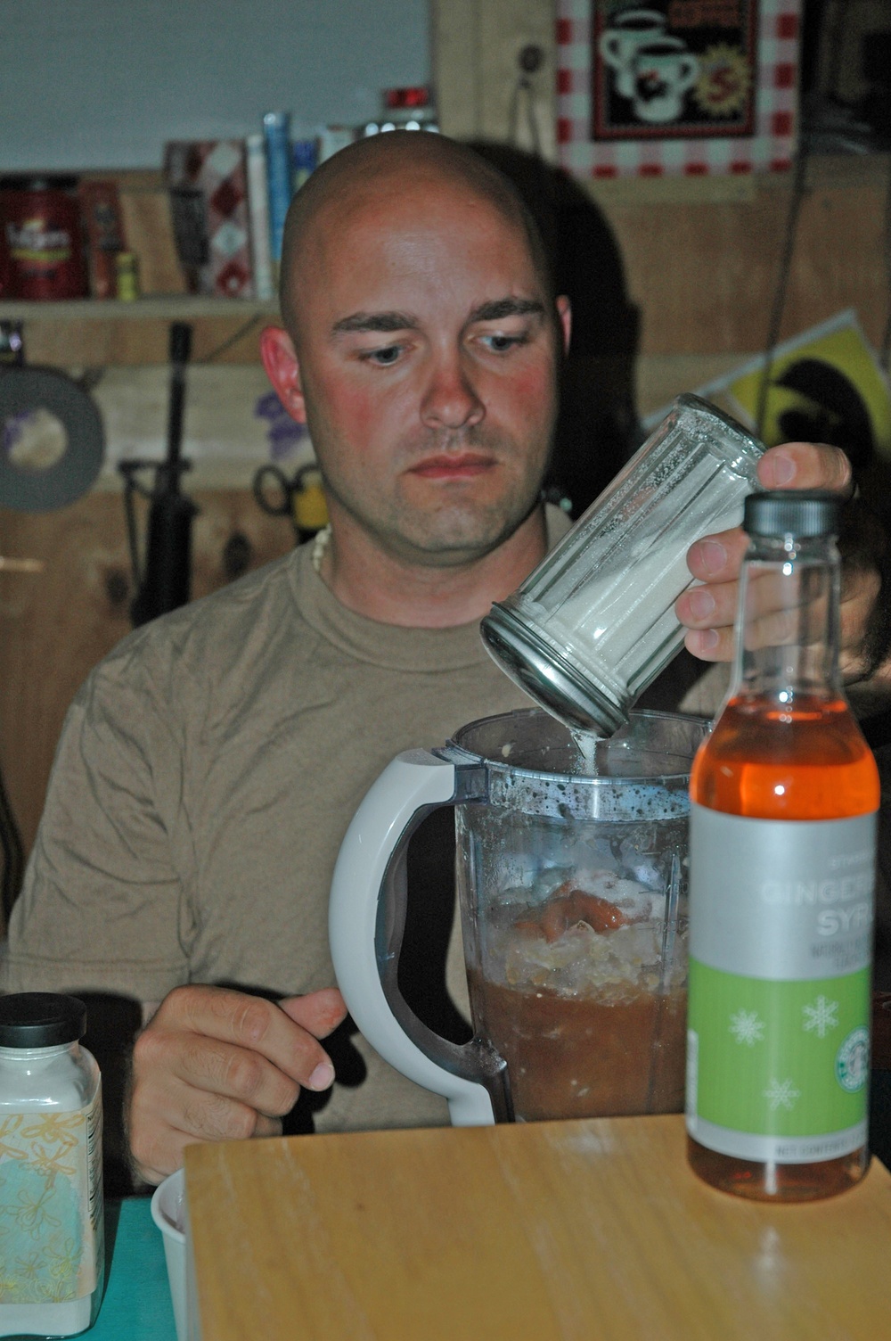 SFC Rick Wiess pours sugar into a blender