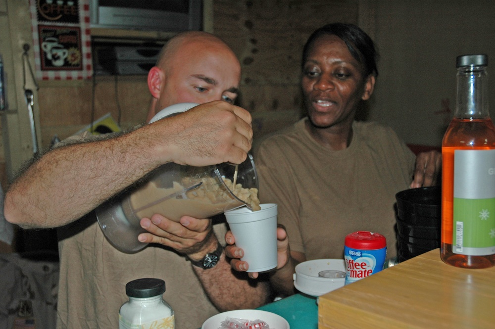 SFC Rick Weiss pours the first-ever batch of iced coffee