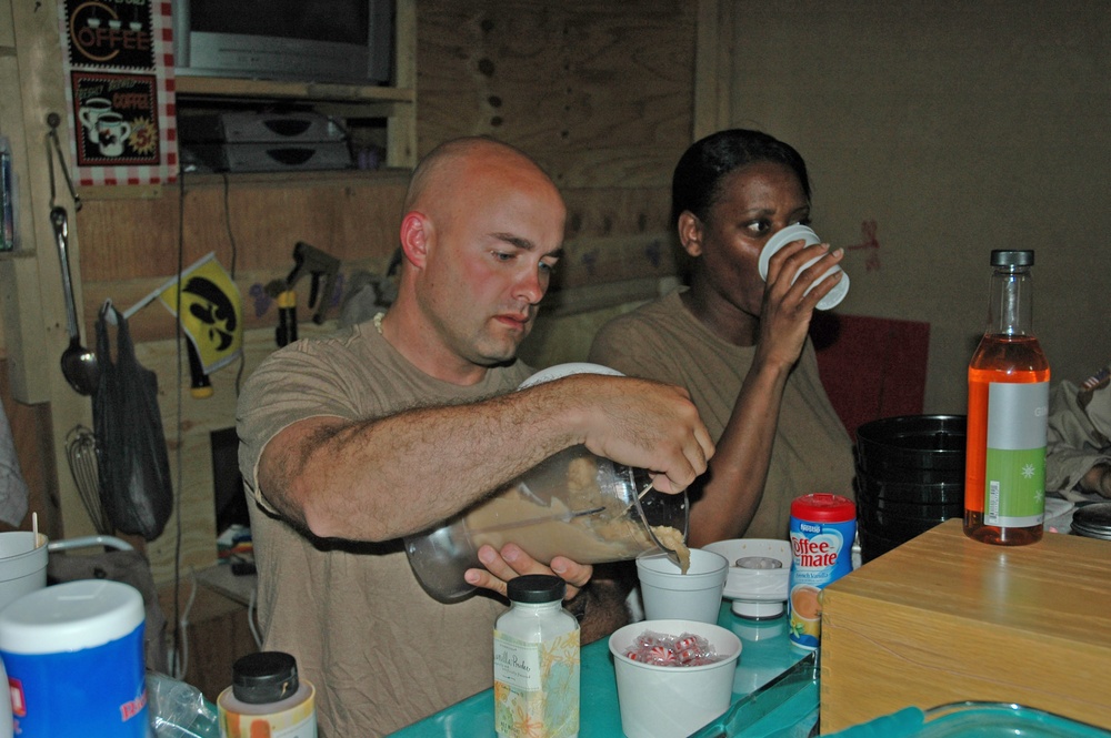 SFC Rick Weiss pours the first-ever batch of iced coffee