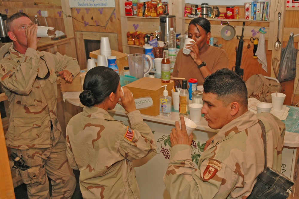 Soldiers try the first batch of iced coffee made